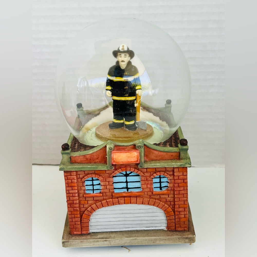 vintage fireman musical snow globe